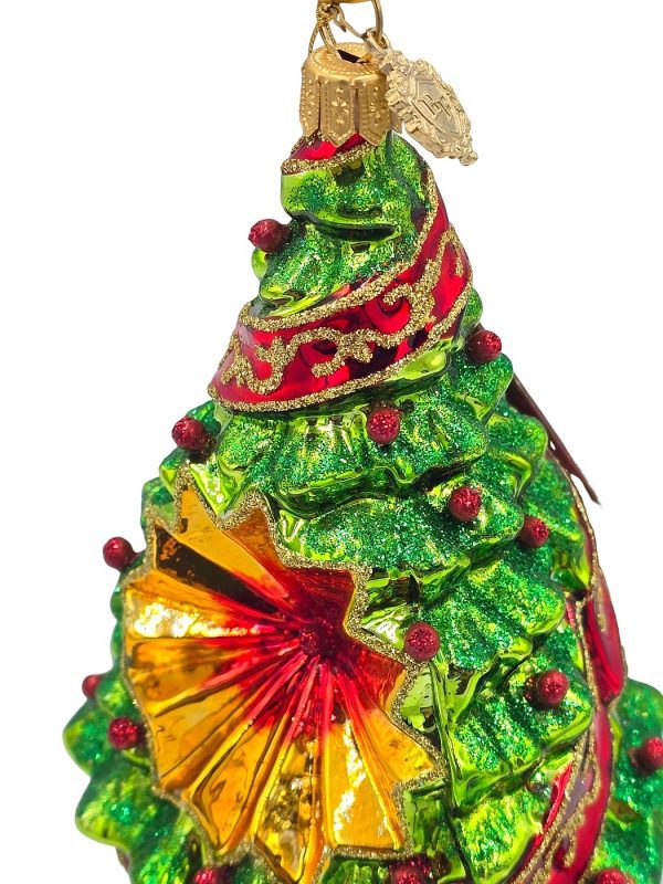 Eglutė – stiklinio žaisliuko detalė: briaunota žvaigždė reflektorius, aukso dulksna ir raudonos uogos